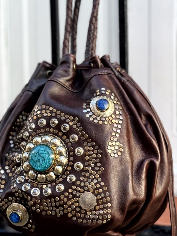 Bolso Redondo con tira  larga ajustable